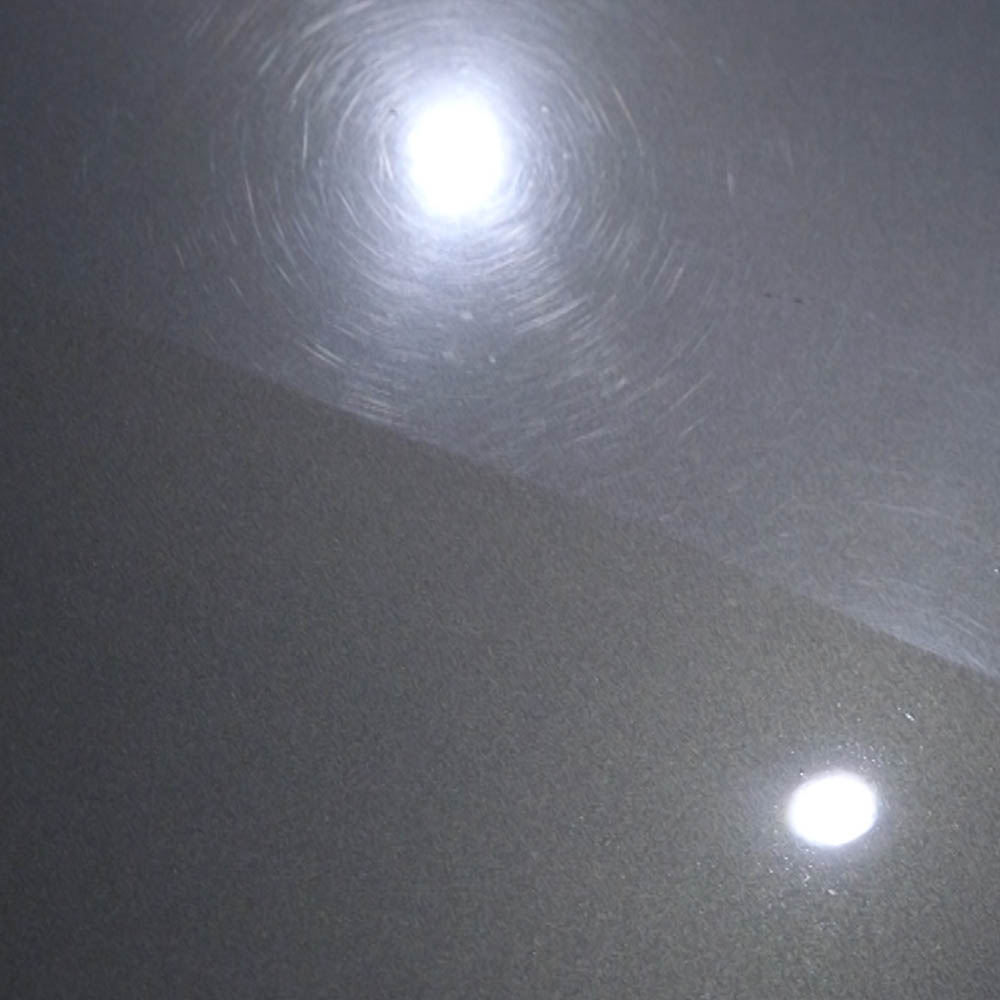 50/50 before and after polishing comparison on car paint