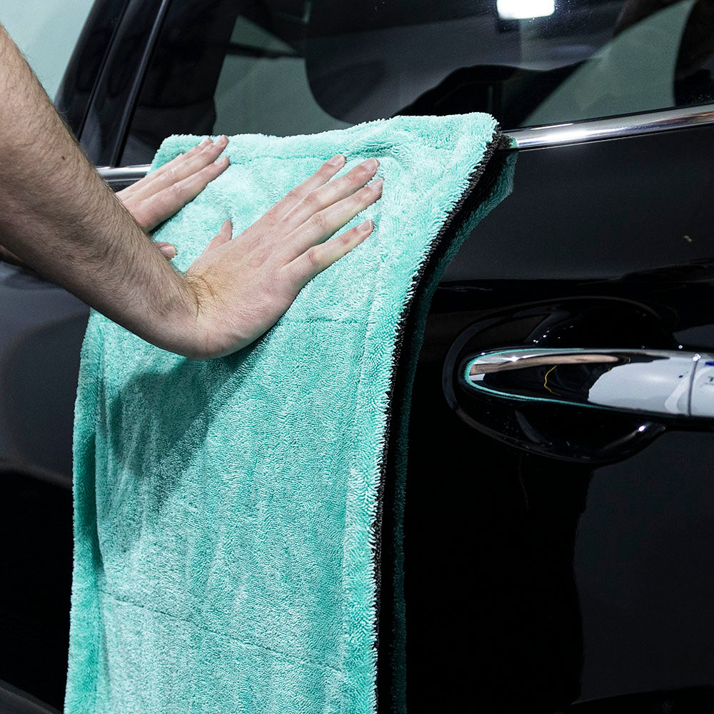 Aquatouch LIL FELLA towel drying a black car