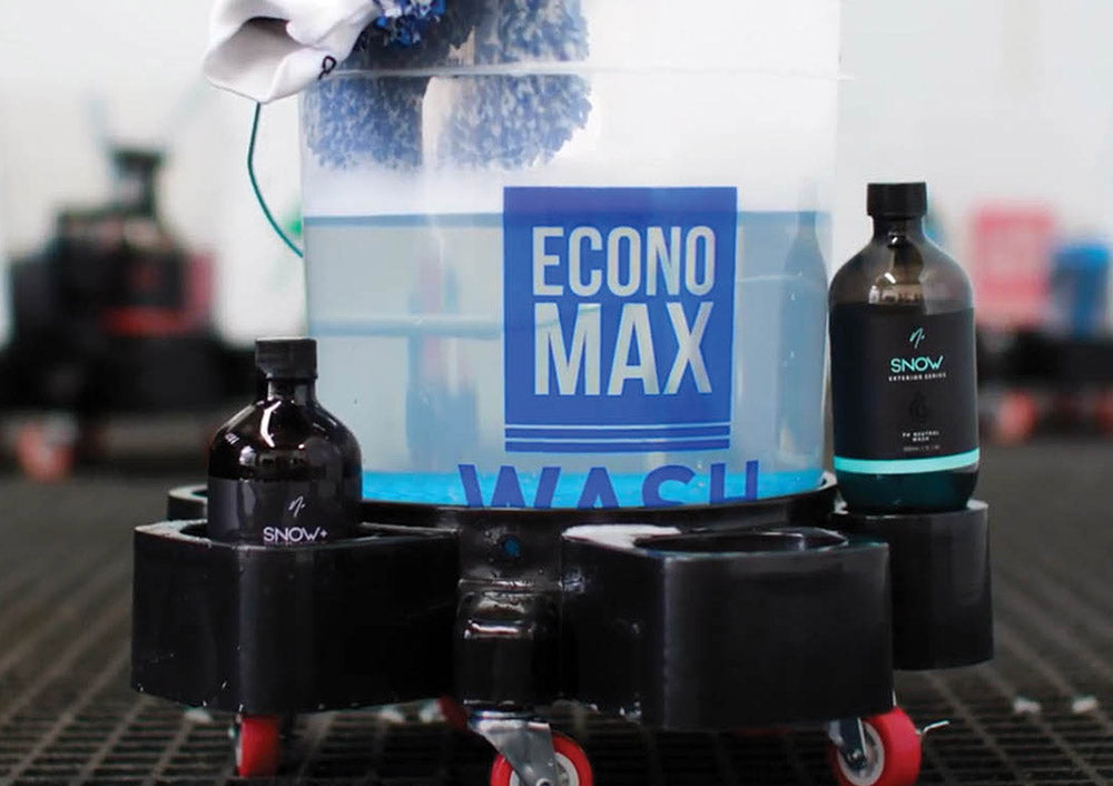 Economax bucket on a dolly with nv snow in the bottle holder