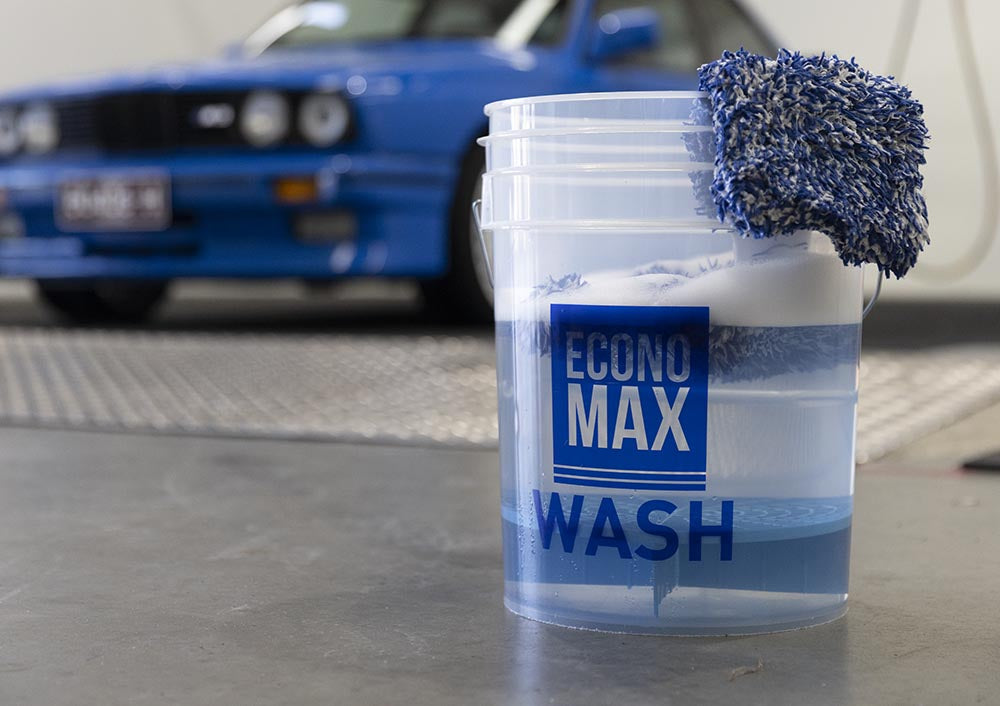 Economax bucket with mitt resting on the rim