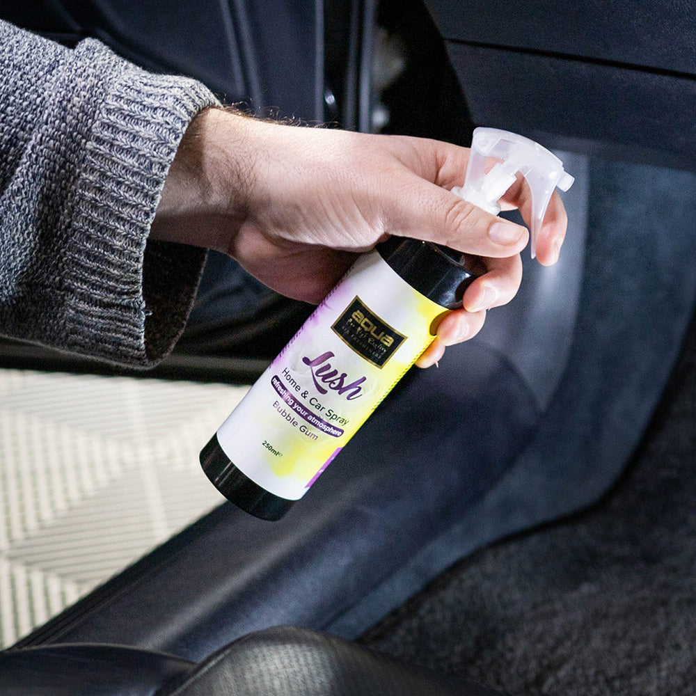 Aroma Aqua Lush Spray In action shot Spraying in car