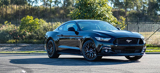 Black Car parked on a road