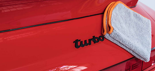 Orange 4 Seasons on red car