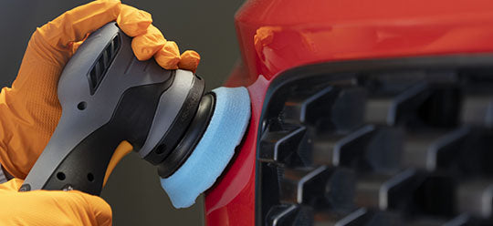 ShineMate EB212 about to start polishing a red car