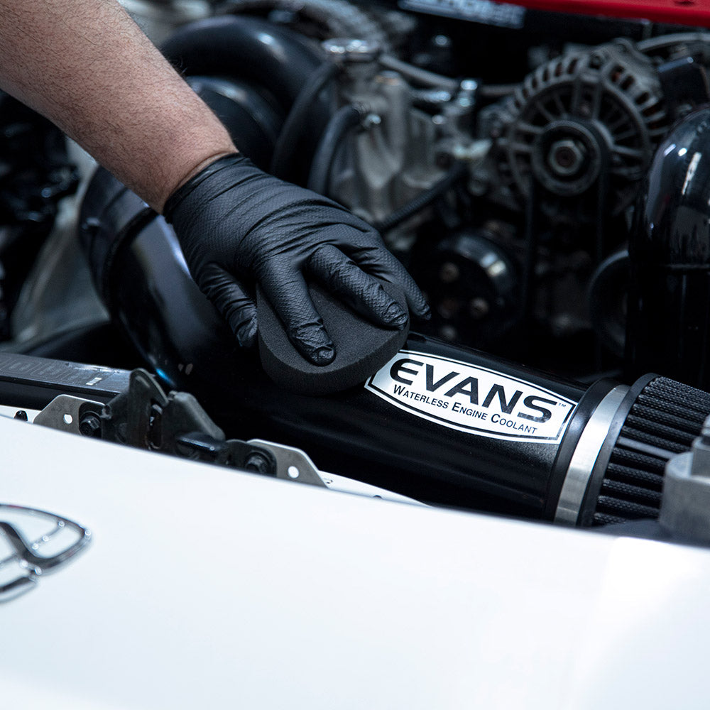 Lake Country CCS black hand applicator being used on car paintwork