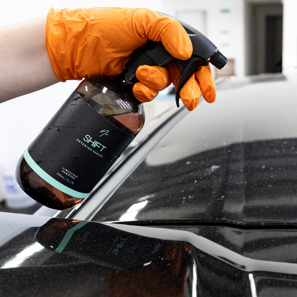 Nv SHIFT being used to remove water spots from a car