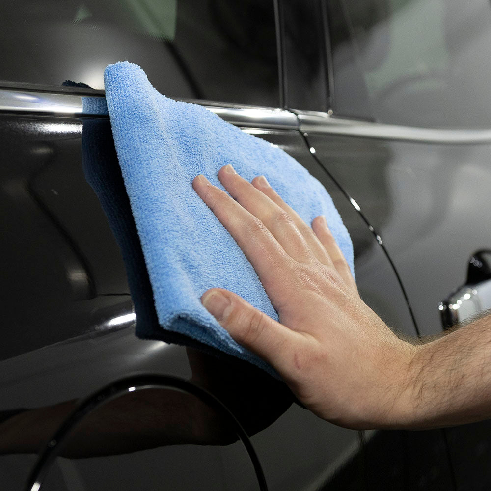 Aquatouch GENERAL microfiber cloth wiping a black panel