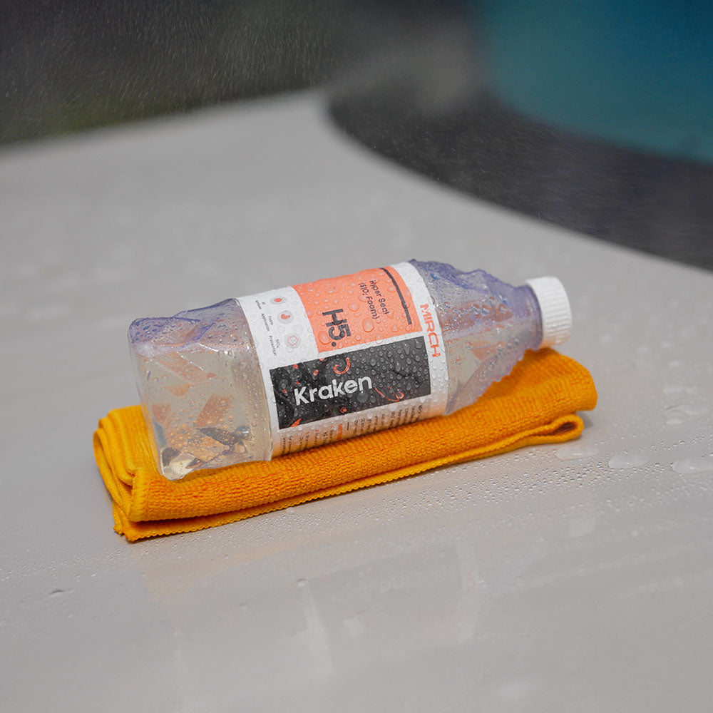 MIRCH Kraken and a microfiber towel on a boot of a silver car