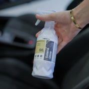 a person holding MIRCH Selene Glow inside a car