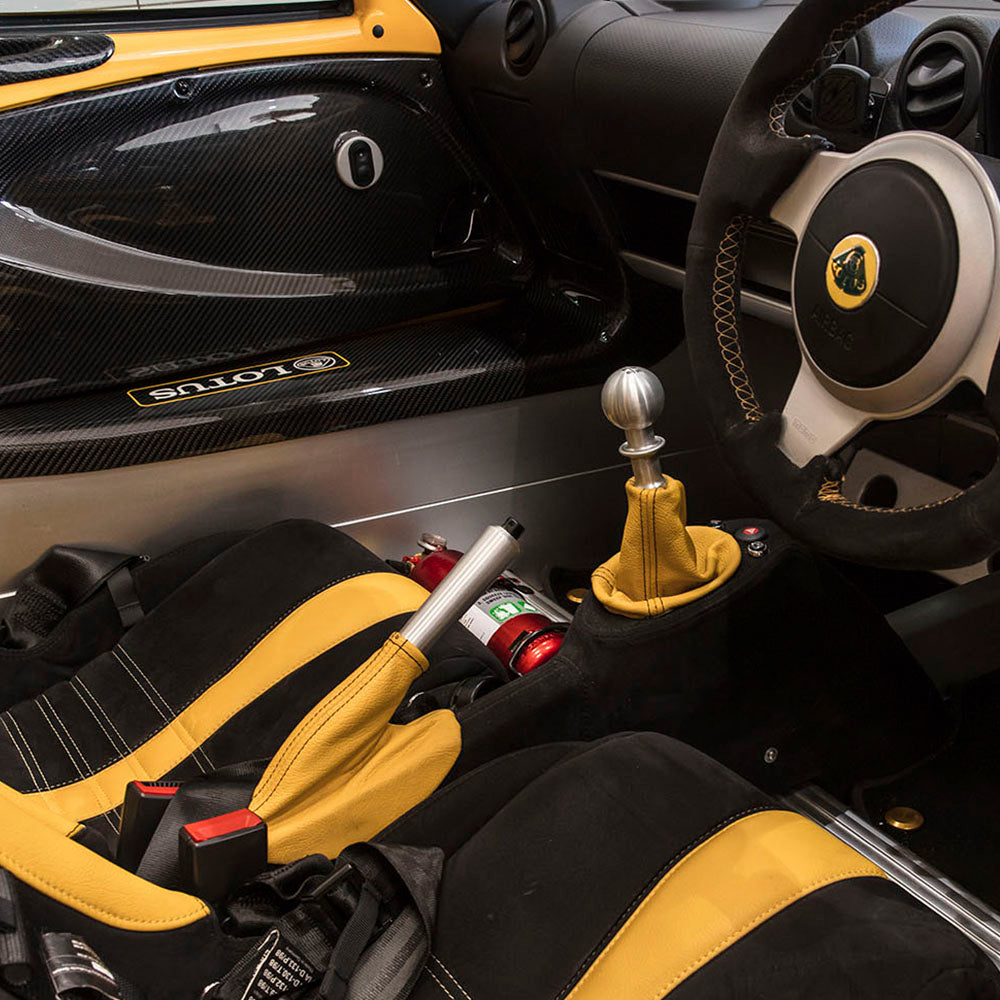 Detailer cleaning a car interior