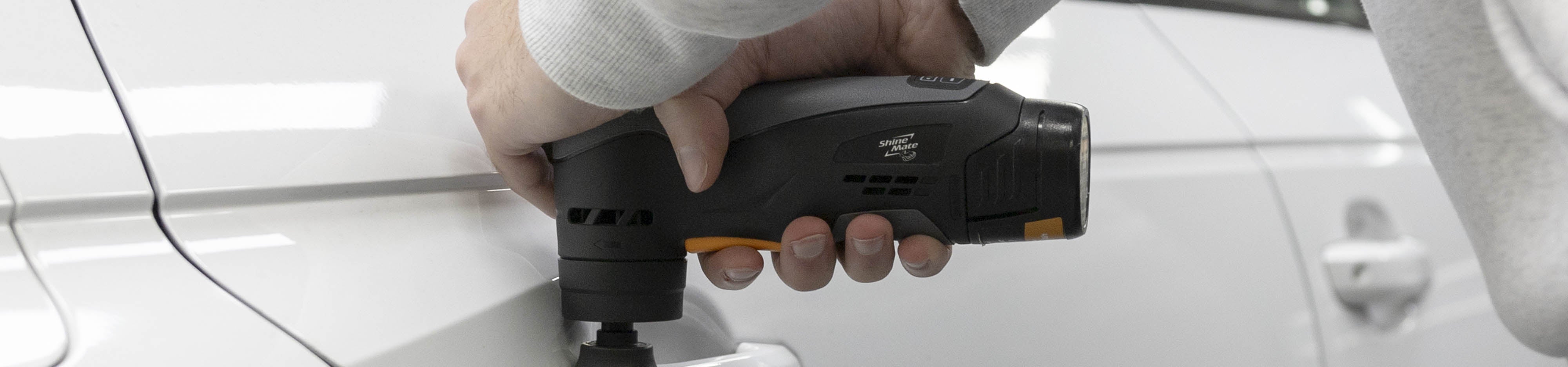 ShineMate Sander about to sand a door handle of white car