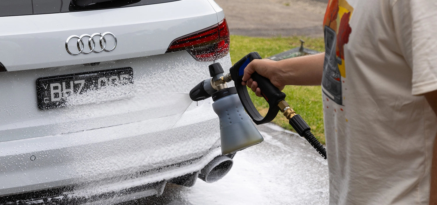 MTM foam cannon spraying white car