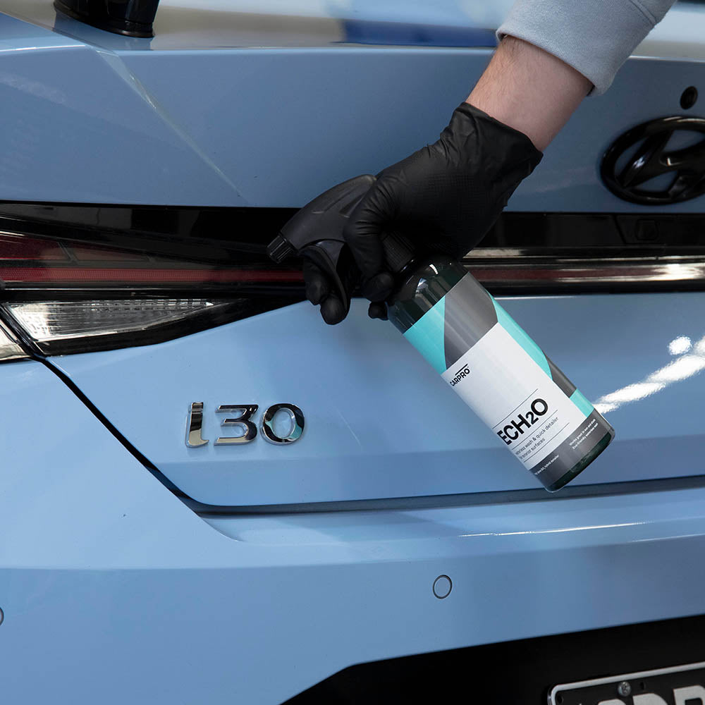 CARPRO ECH2O Concentrate in use on a car