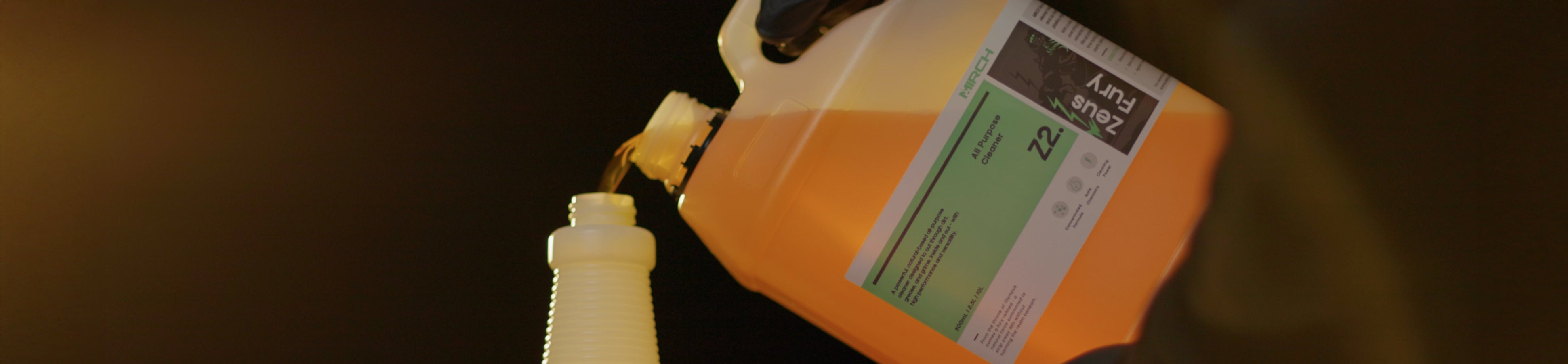 Pouring 4L Zeus Fury into dilute bottle
