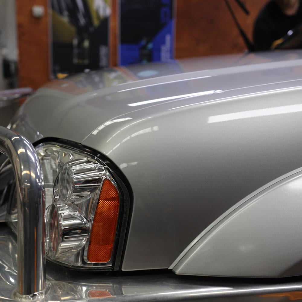 Silver Car reflection after it was professionally coated