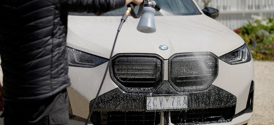 Foaming up a white car with Kraken inside of a MTM foam cannon