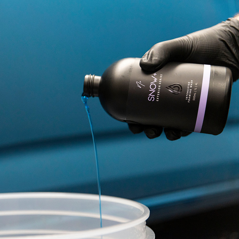 Nv SNOW+ 500 mL being poured into an Economax Detailing Wash Bucket