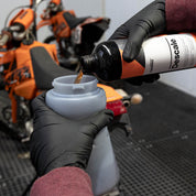 Carpro Descale being poured into the MTM Foam Cannon Wide Mouth