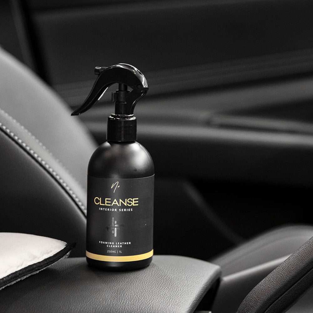 Nv CLEANSE leather cleaner in use on car leather