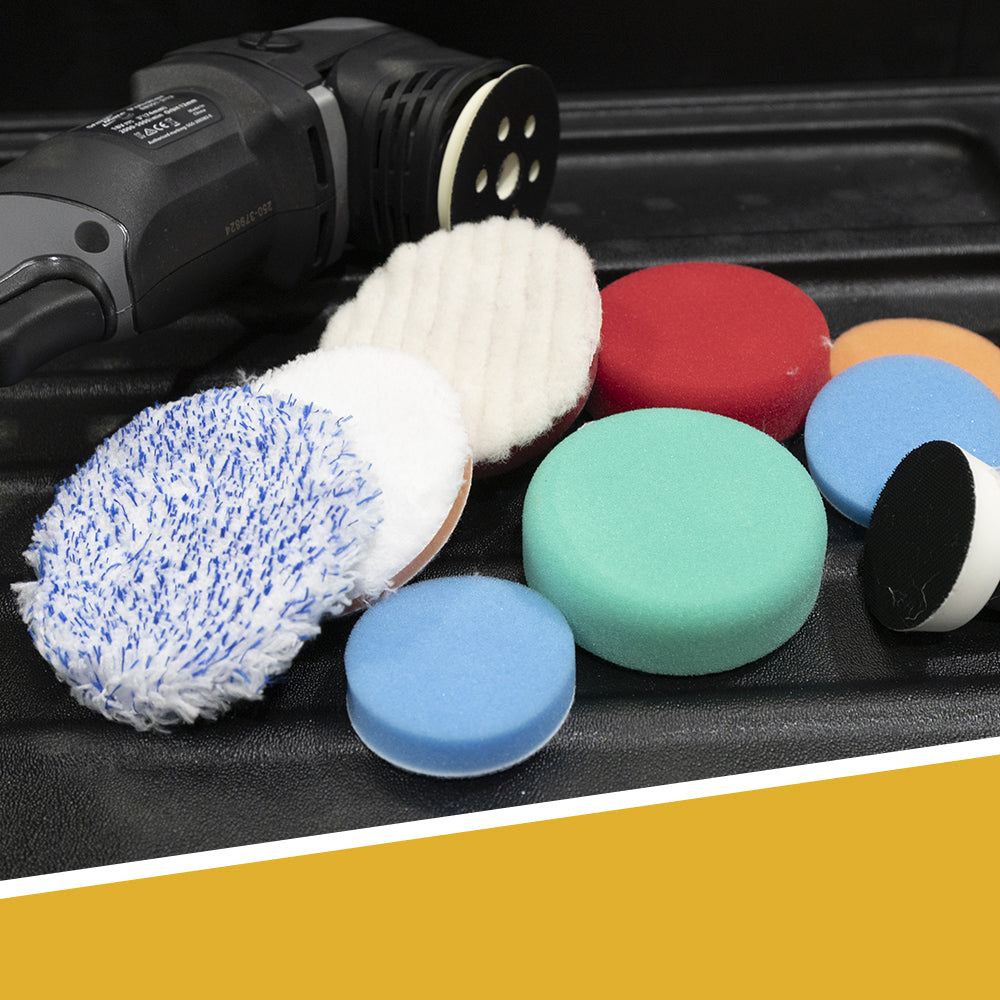 Various polishing pads on a bench 