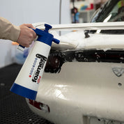 Kwazar Venus Super Foamer 2L action shot being sprayed onto a white coupe