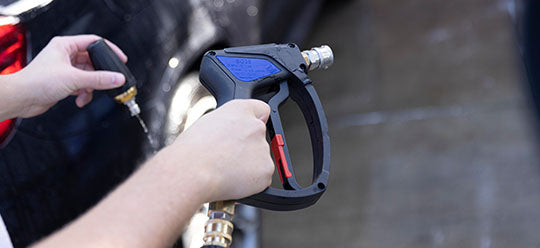 A person holding a MTM Short Gun and Turbo Nozzle